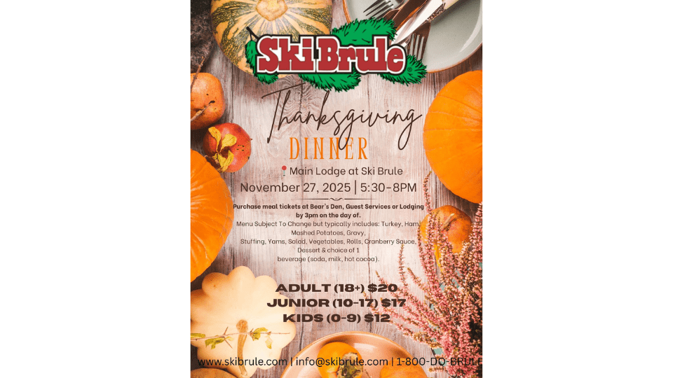 Thanksgiving dinner table at Ski Brule Main Lodge with pumpkins and fall décor in Iron River, Michigan