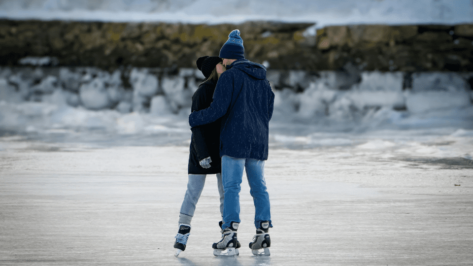 a couple enjoying iceskating